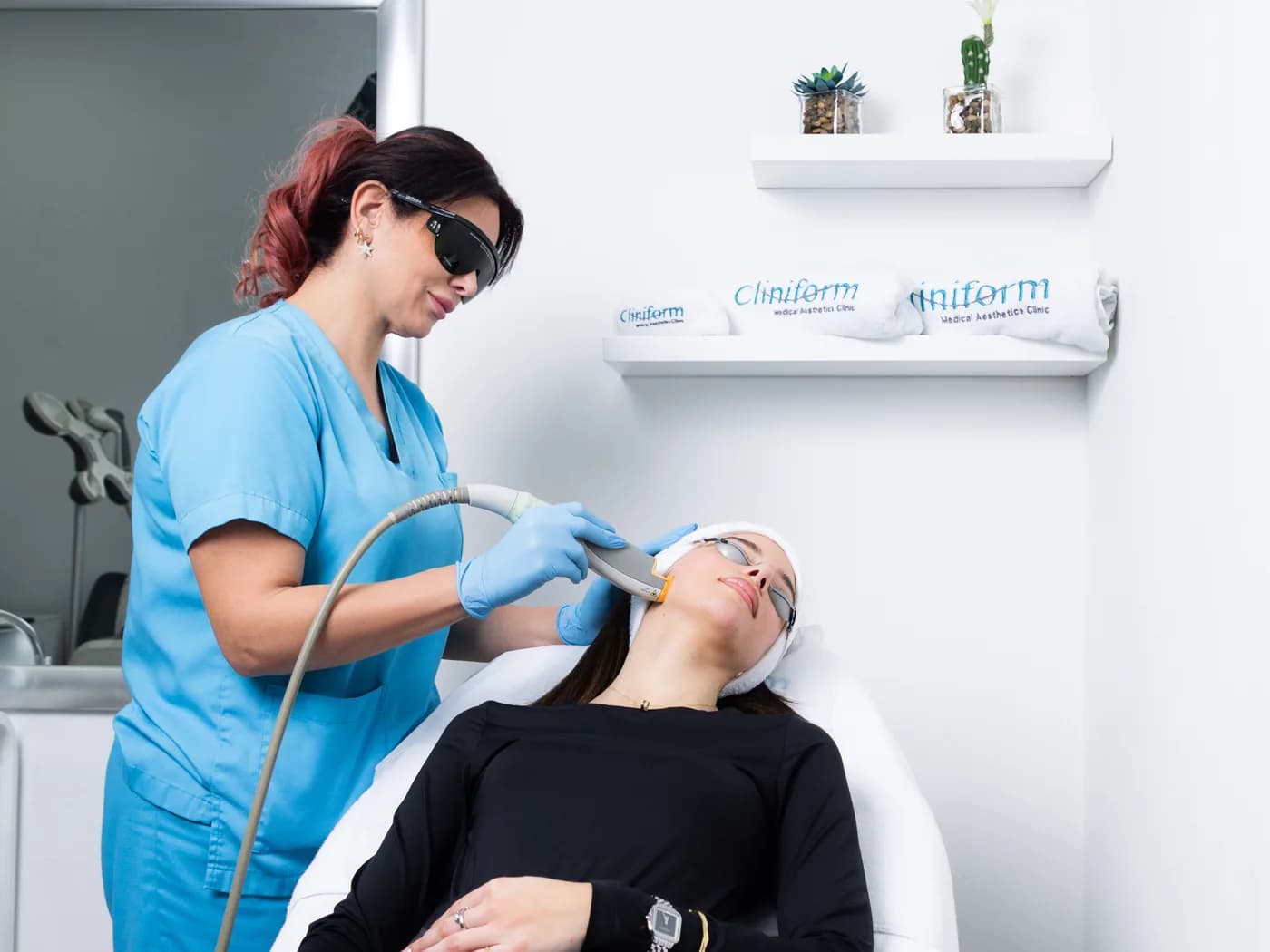 Cliniform specialists performing a laser treatment