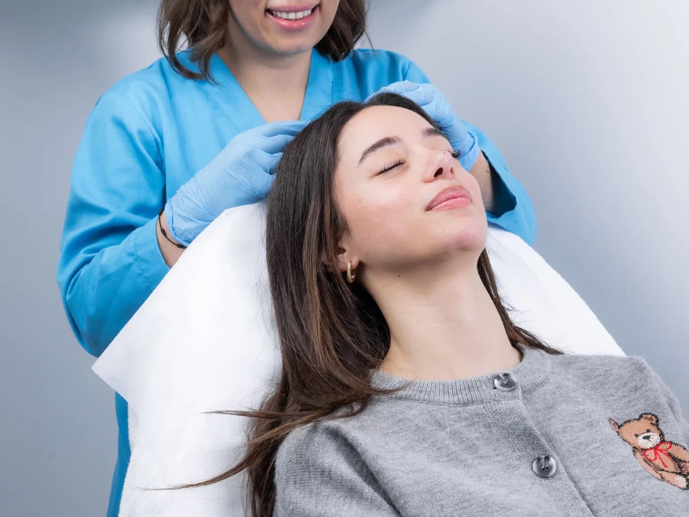 A Cliniform clinician caring for a patient